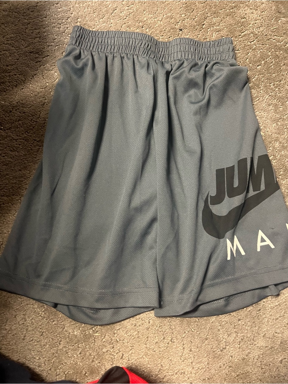 Jordan Men’s Gray Athletic Shorts with Jumpman Graphic